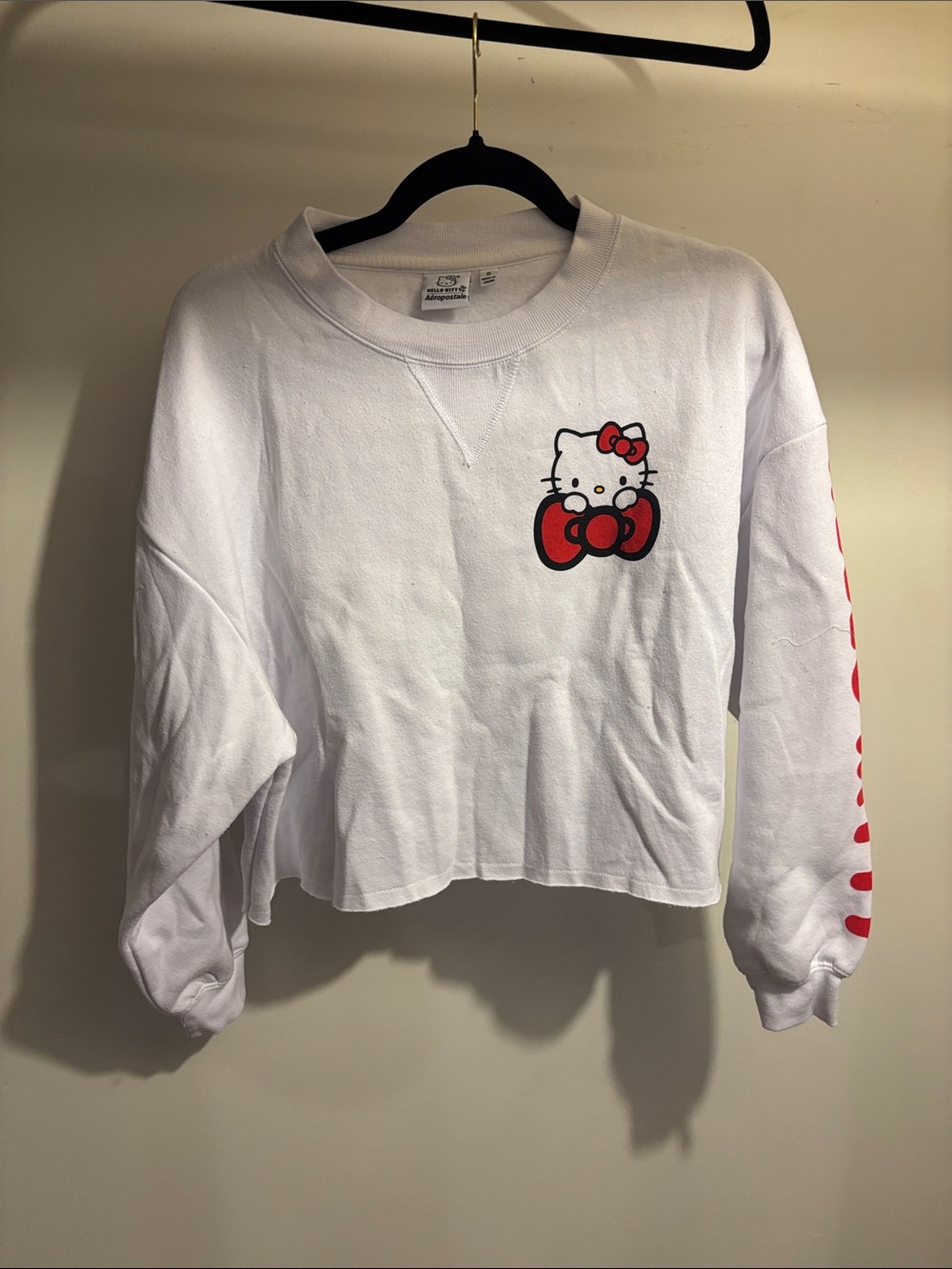Hello Kitty White Cropped Crewneck Sweatshirt with Red Bow Graphics